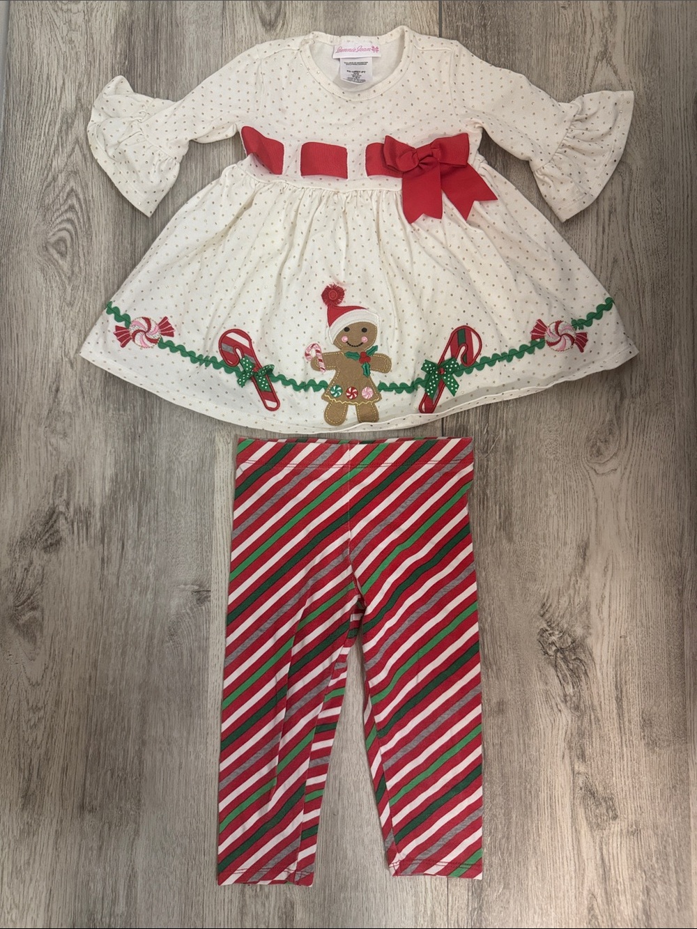 Bonnie Jean Cream Dress top with Red Bow & Candy Cane Stripe Leggings